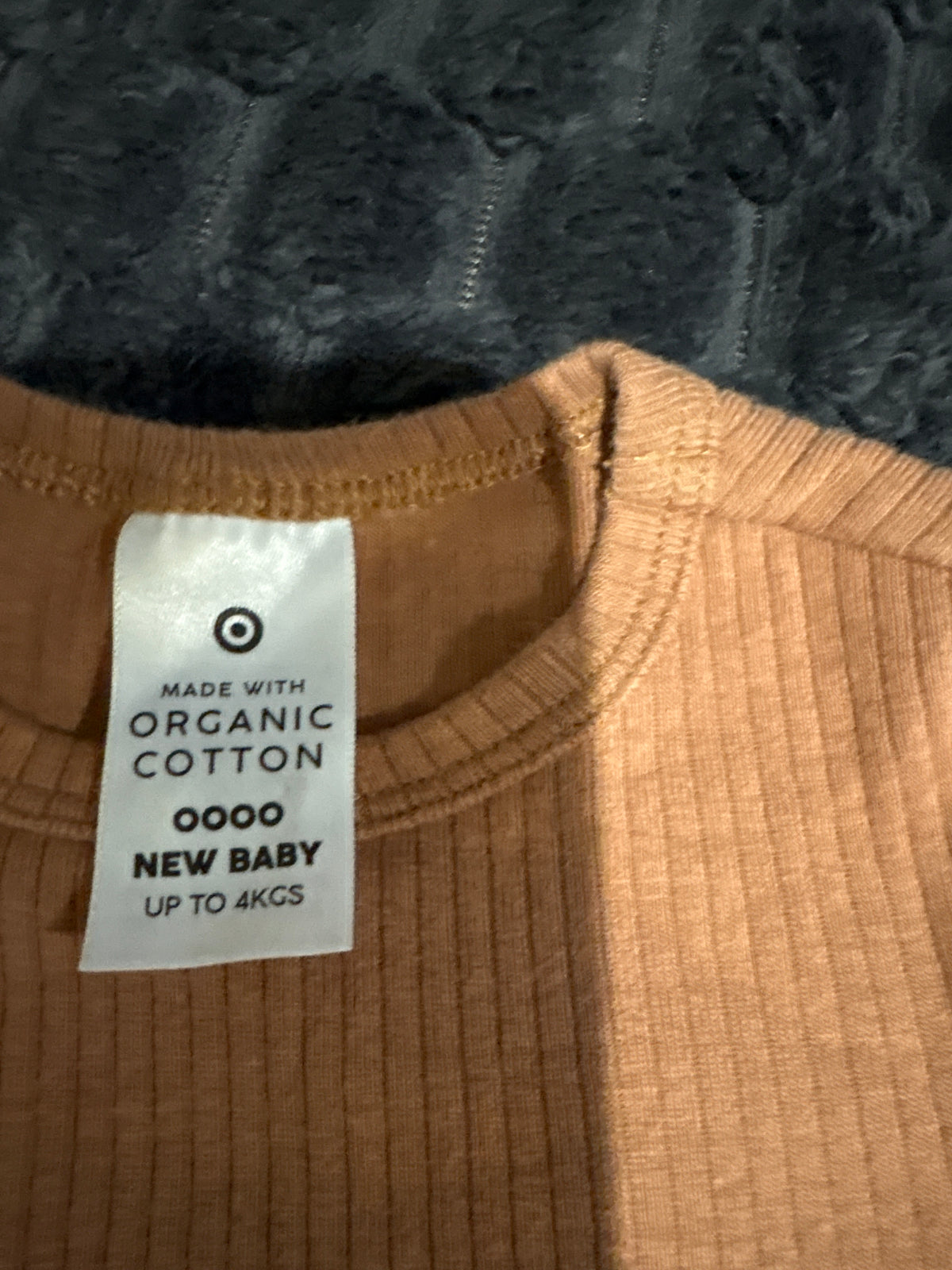 Target organic cotton long sleeve bodysuit. Size 0000