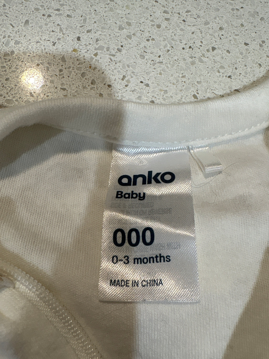 4 size 000 coveralls including Bonds, Anko & Dymples