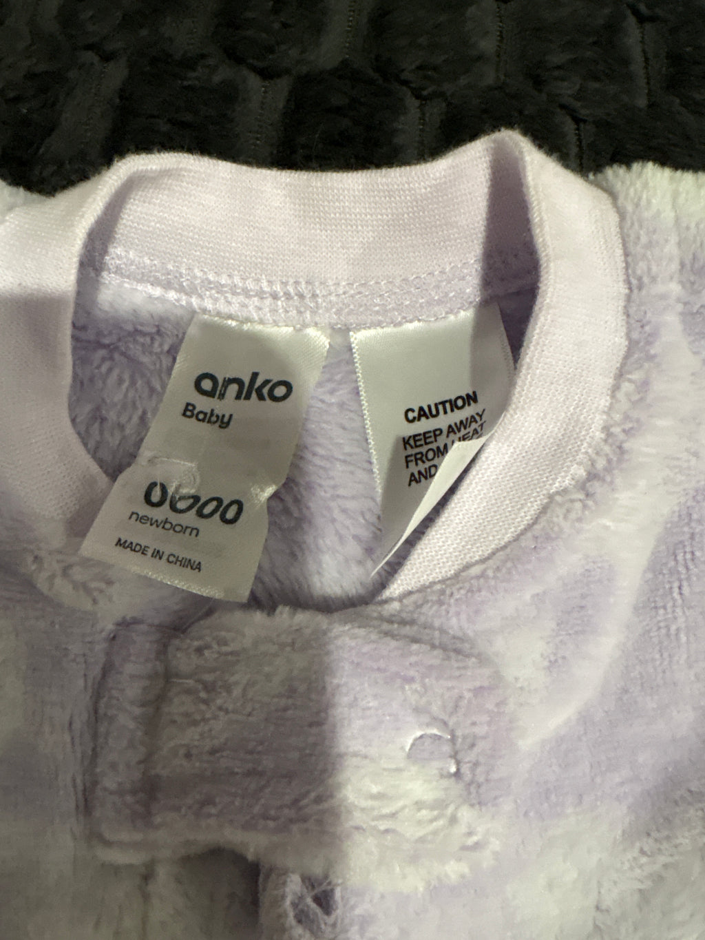 Anko purple and white fleece coverall. Size 0000