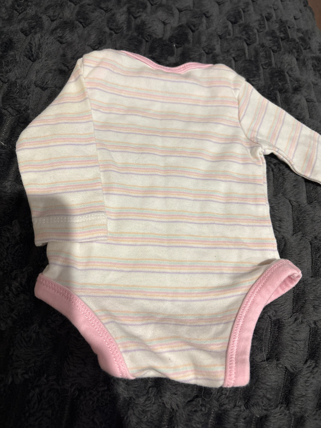 Tiny Treasures long sleeve body suit. Size 0000