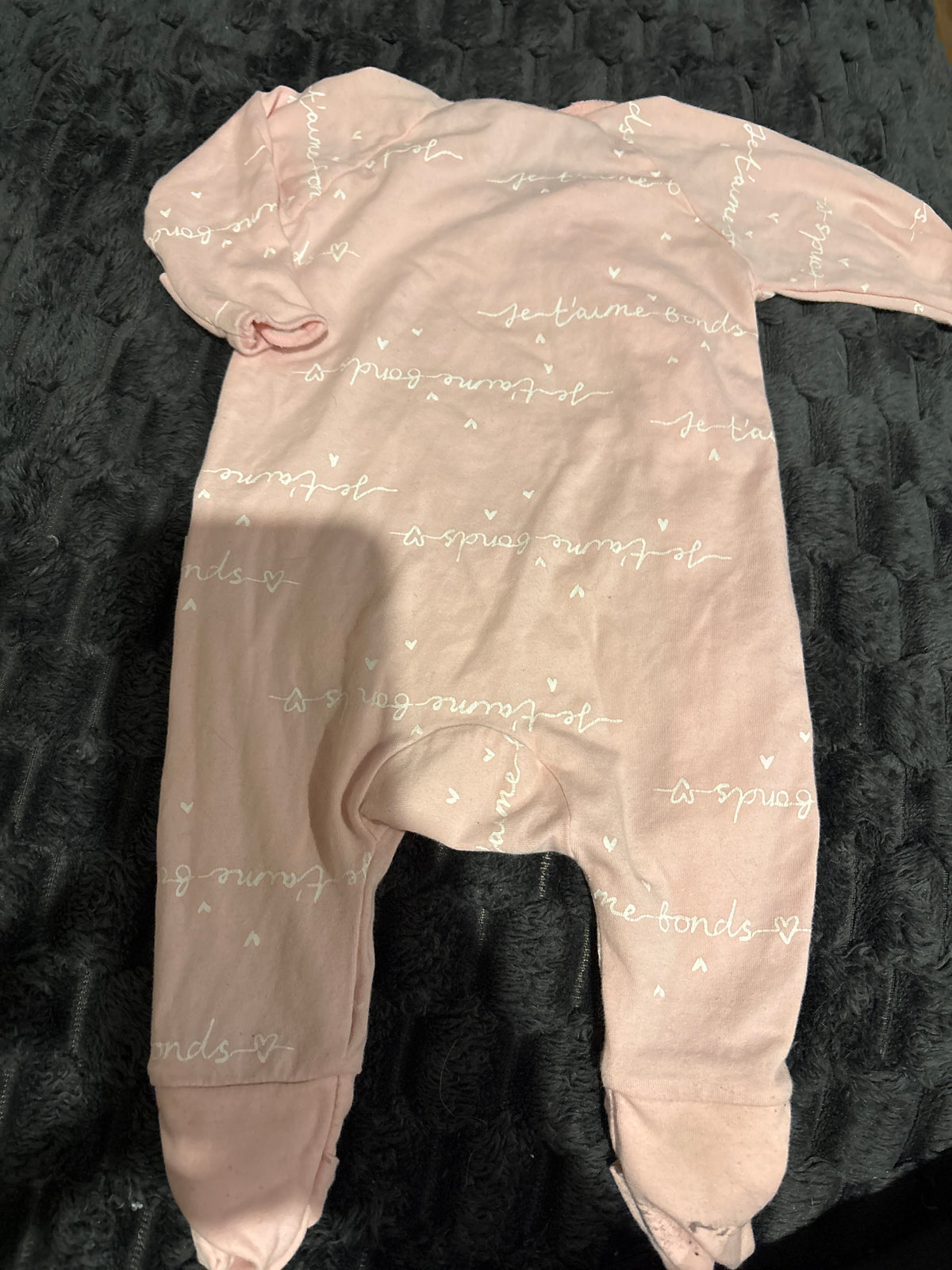 Bonds light pink Cozysuit. Size 0000