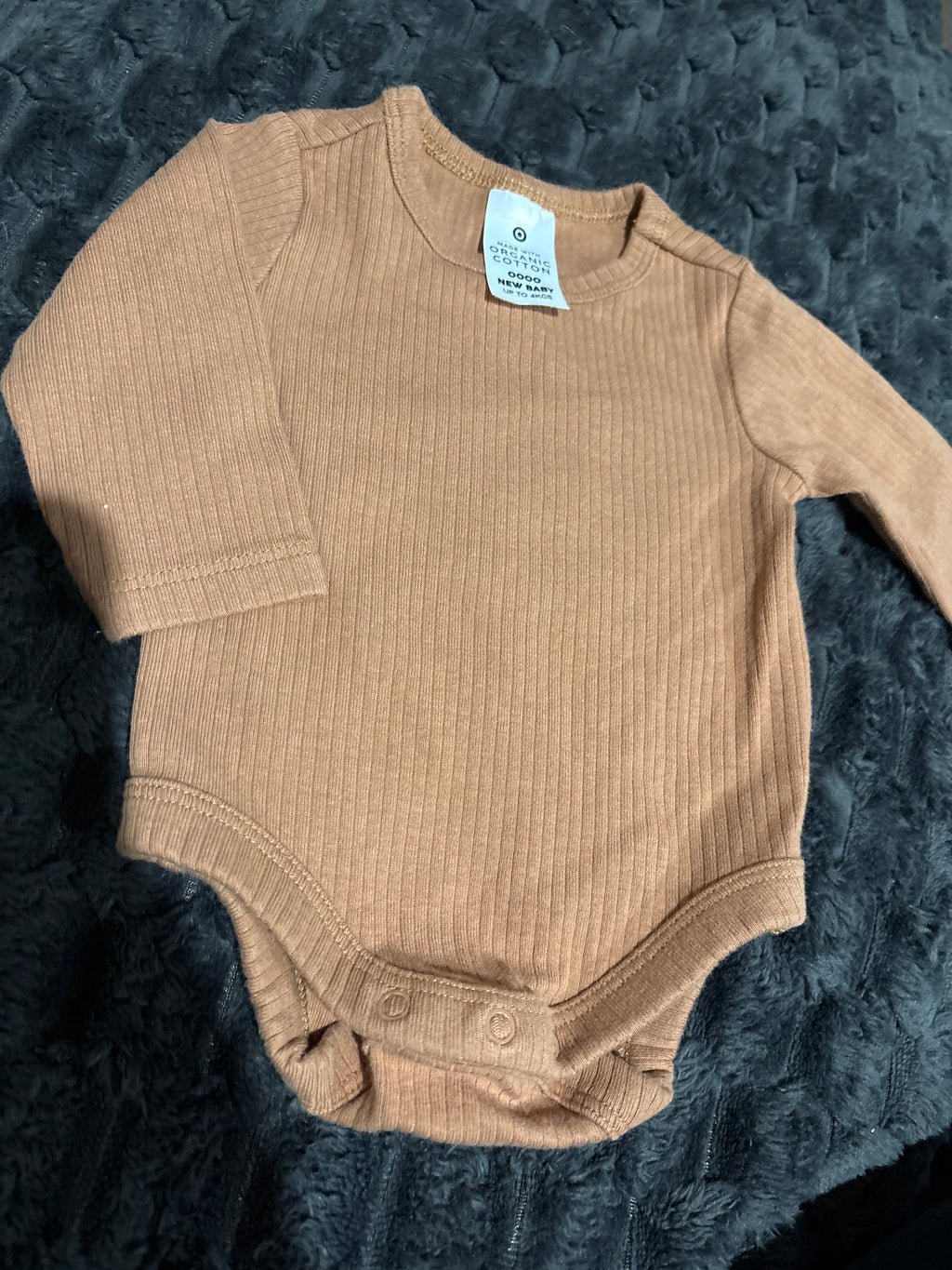 Target organic cotton long sleeve bodysuit. Size 0000