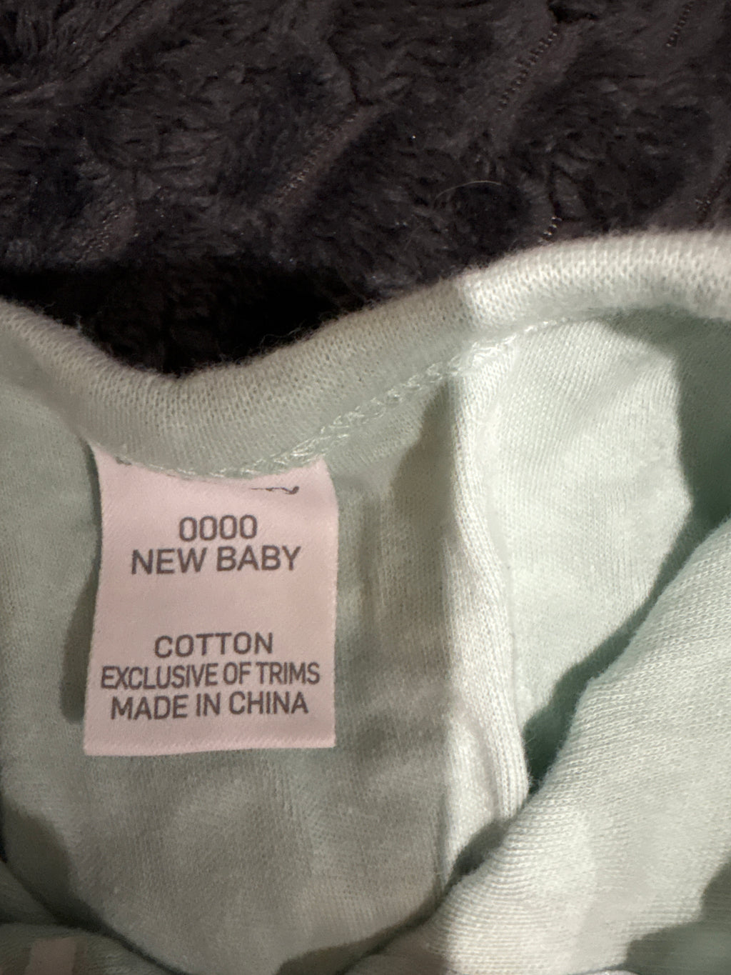 Baby Berry unisex pale green and white patterned coverall. Size 0000