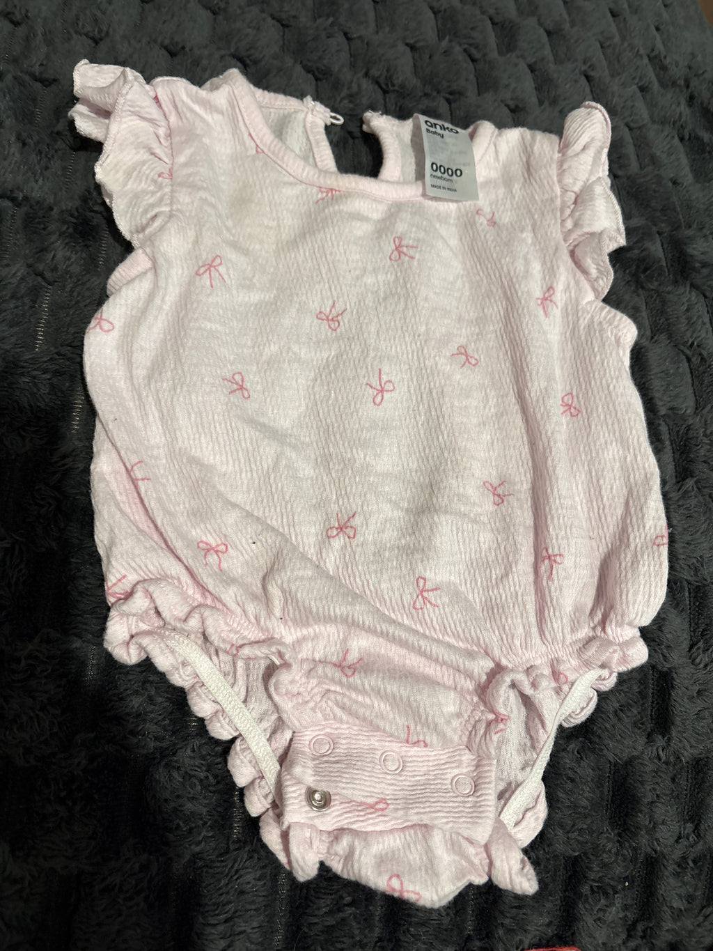 Anko singlet body suit with frilly shoulders. Size 0000