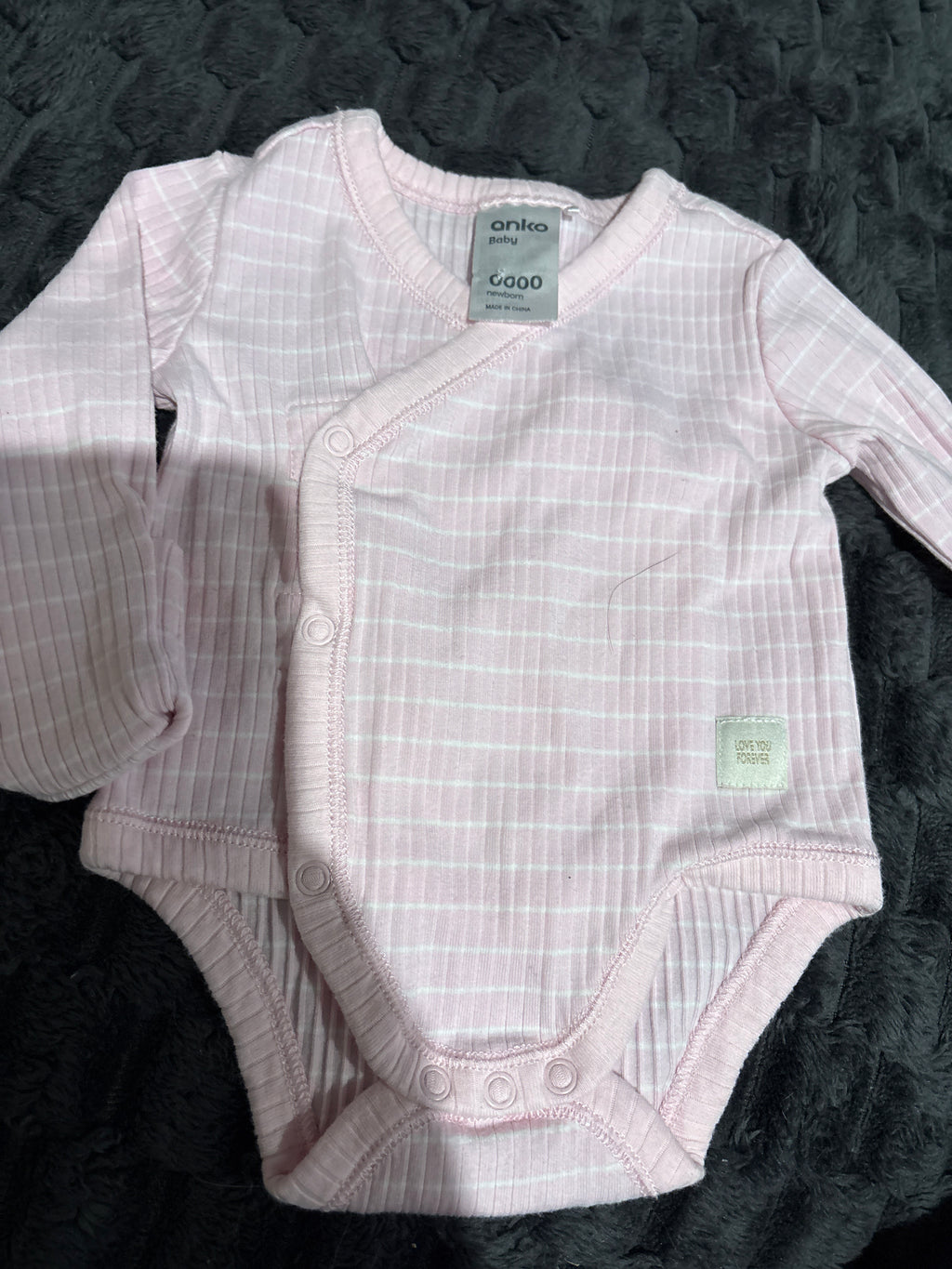 Anko ribbed long sleeve pink stripe body suit. Size 0000