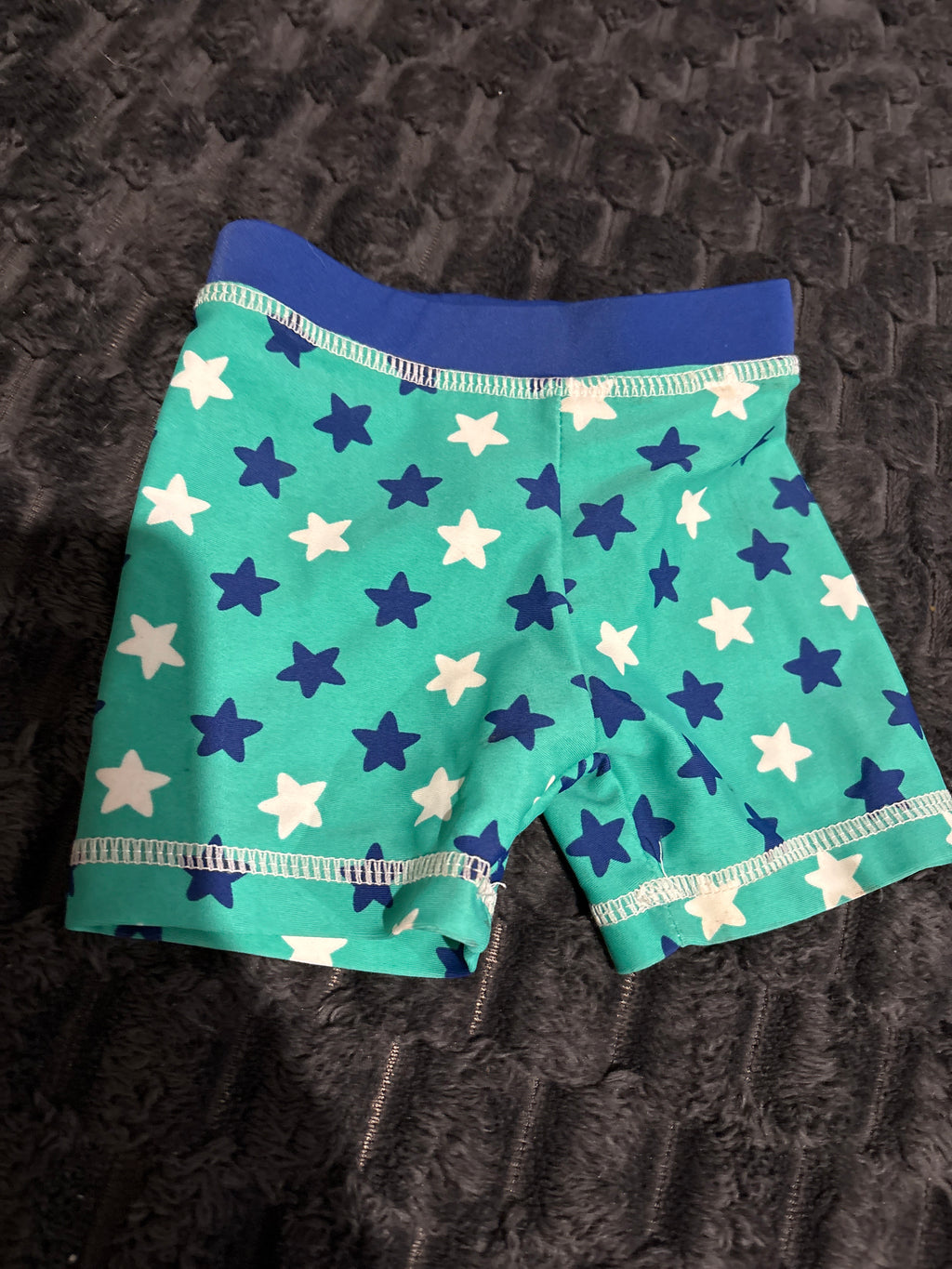 Tiny Little Wonders swim shorts. Size 000