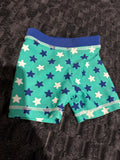 Tiny Little Wonders swim shorts. Size 000