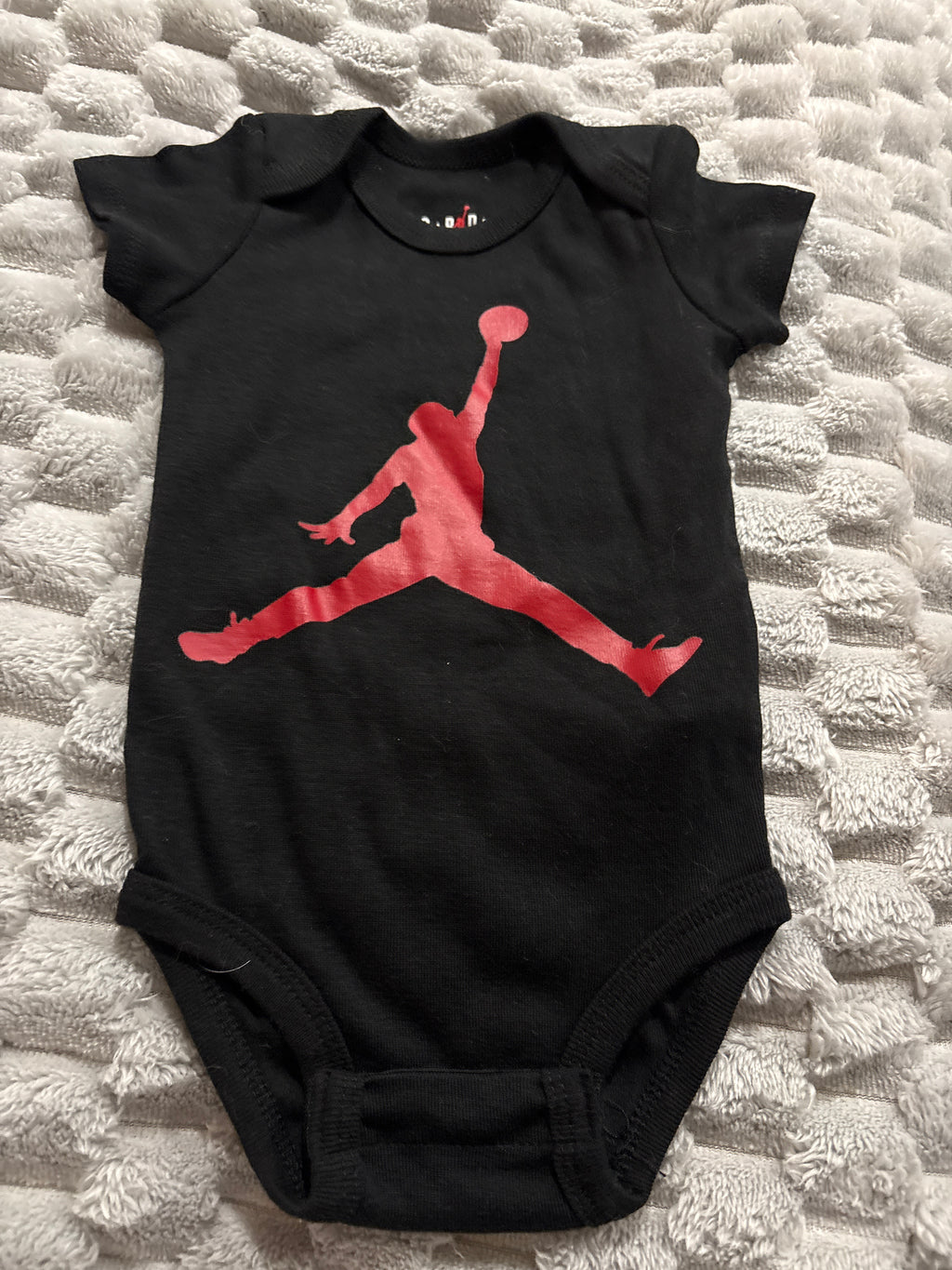 Jordon short sleeve romper. Size 0-6 months.