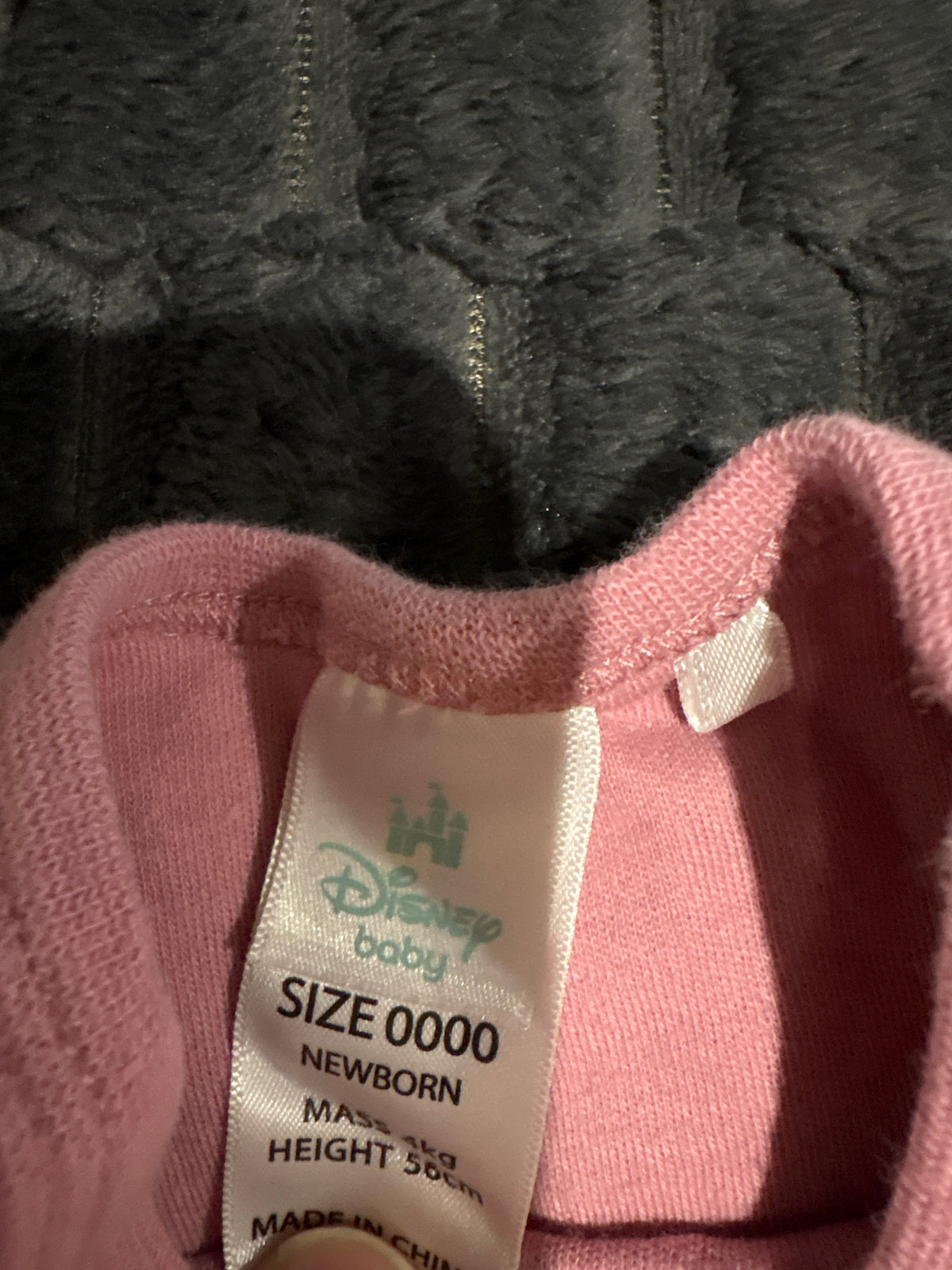 Disney Minnie Mouse long sleeve bodysuit. Size 0000