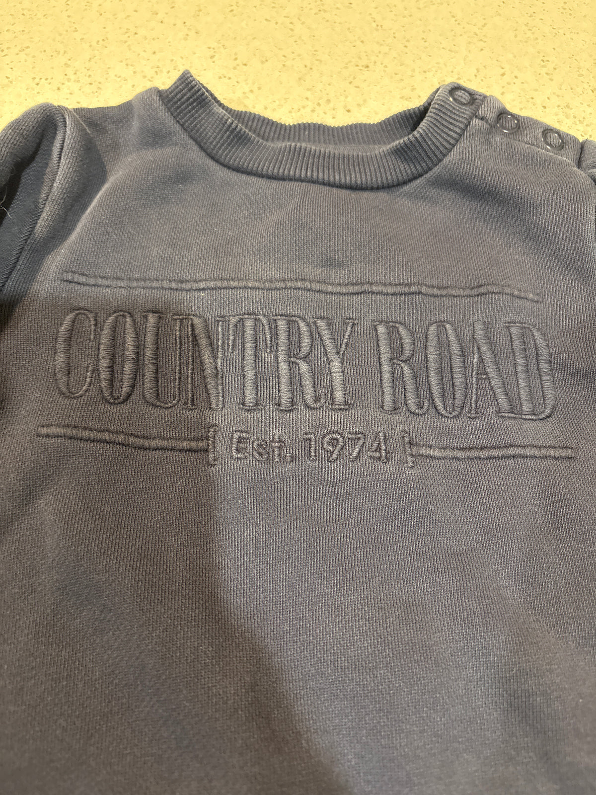 Country Road worn look sweater. Size 0-3 months