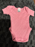 Anko short sleeve body suit with pattern. Size 00000